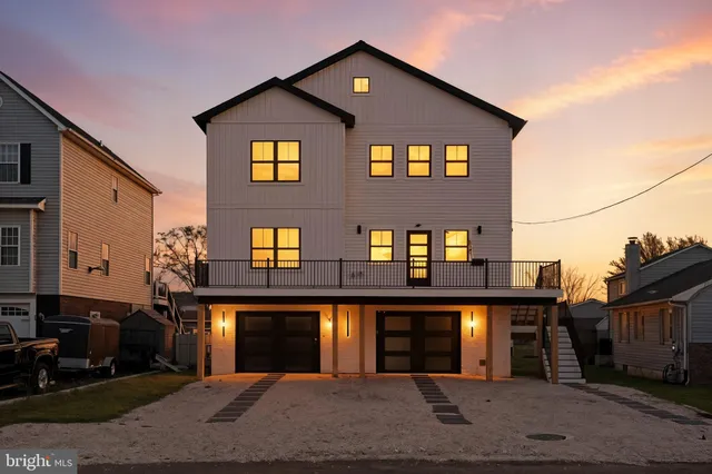 a front view of a house with yard