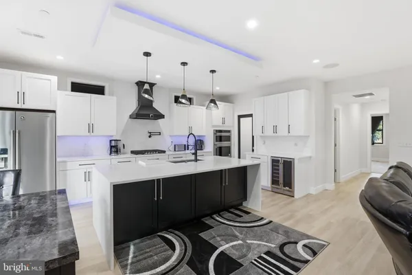 a bed room with a bed and a chair