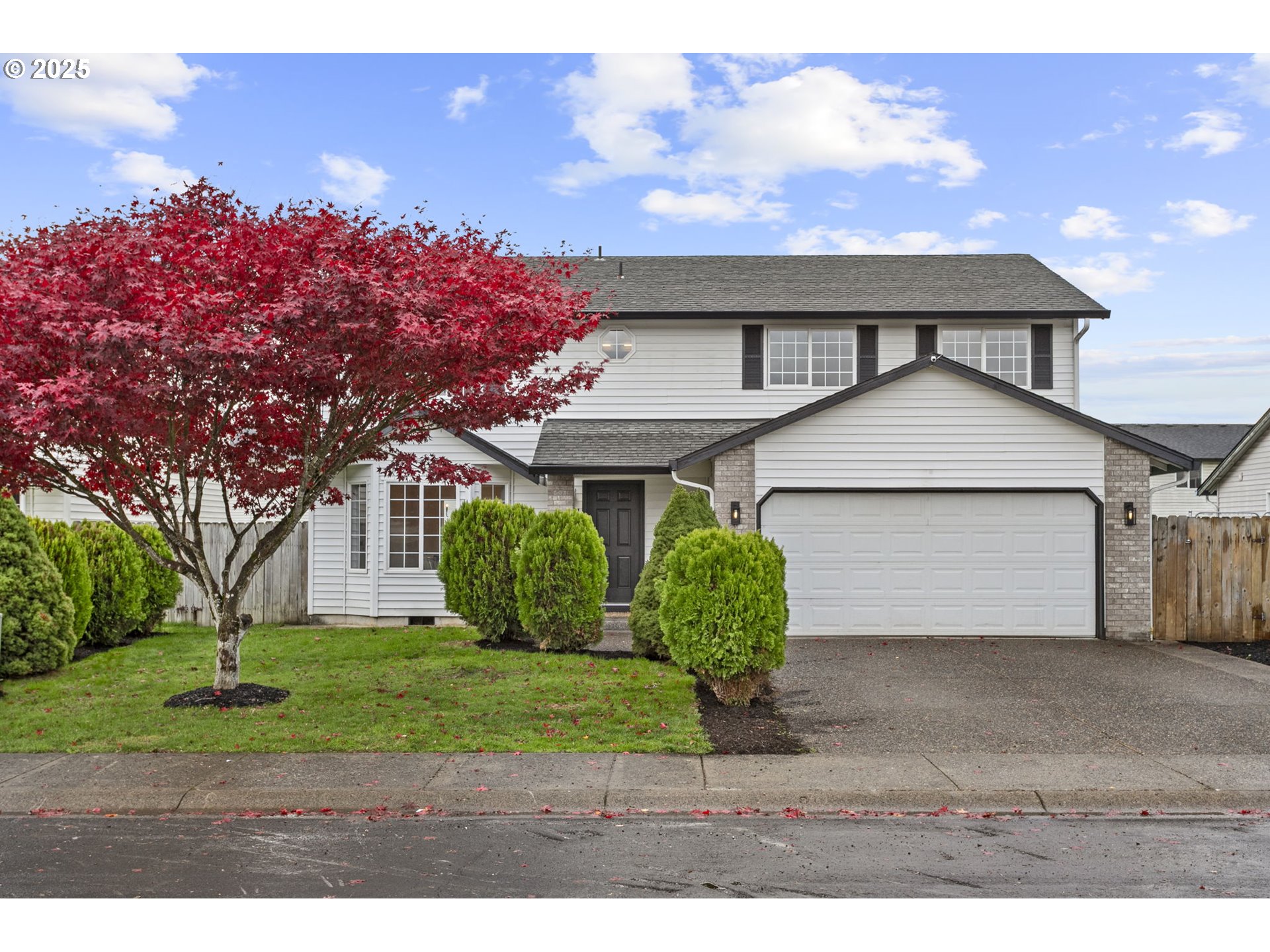 16301 Northeast 77th Circle Vancouver, WA 98682 - Photo 1 of 44 a front view of a house with garden