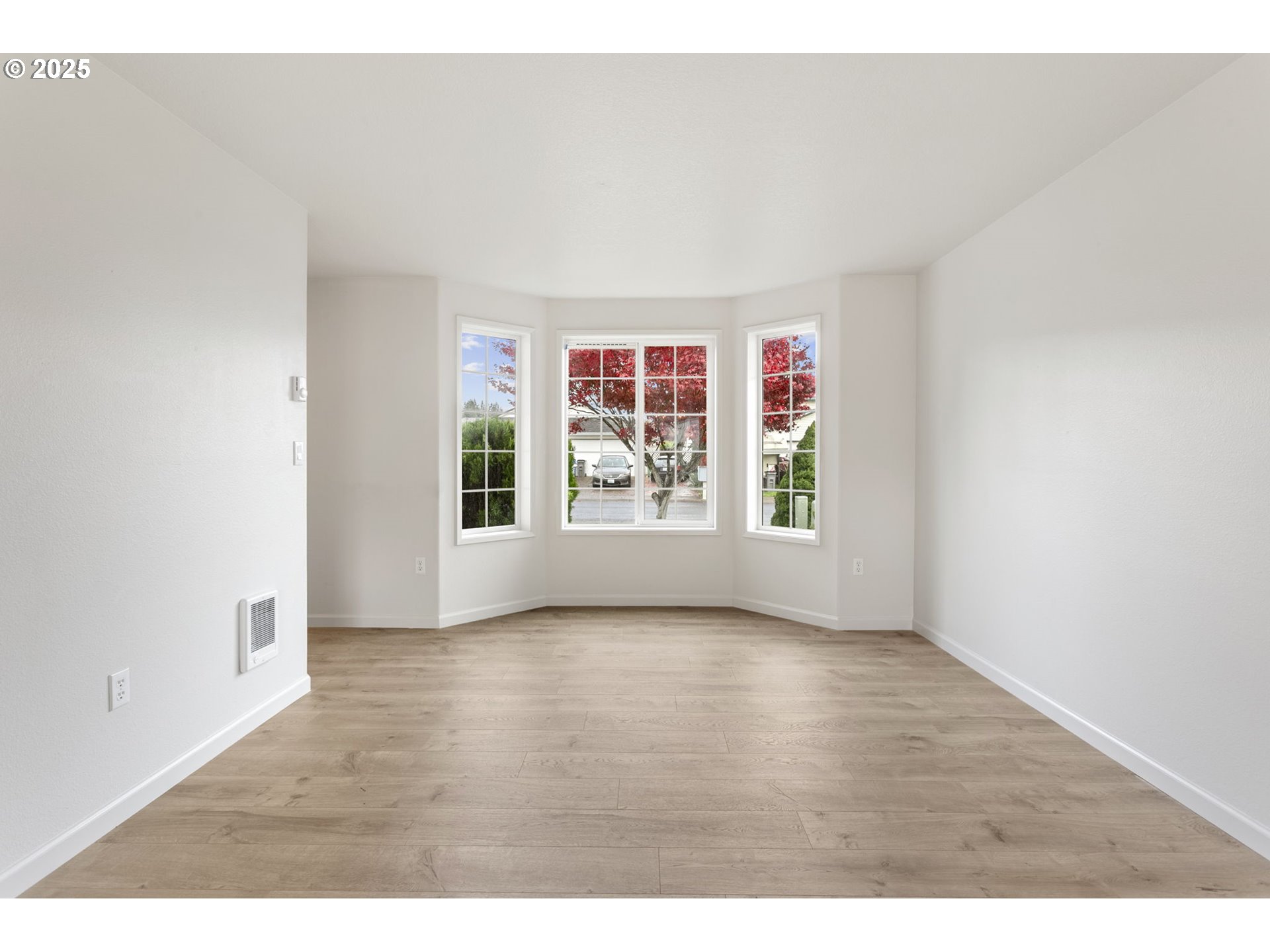 16301 Northeast 77th Circle Vancouver, WA 98682 - Photo 15 of 44 an empty room with wooden floor and windows