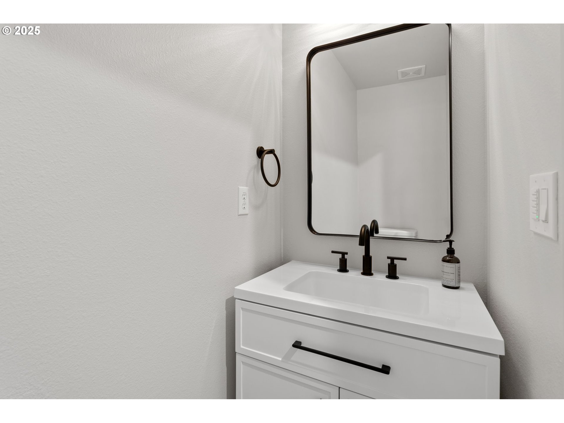 16301 Northeast 77th Circle Vancouver, WA 98682 - Photo 23 of 44 a bathroom with a sink and mirror