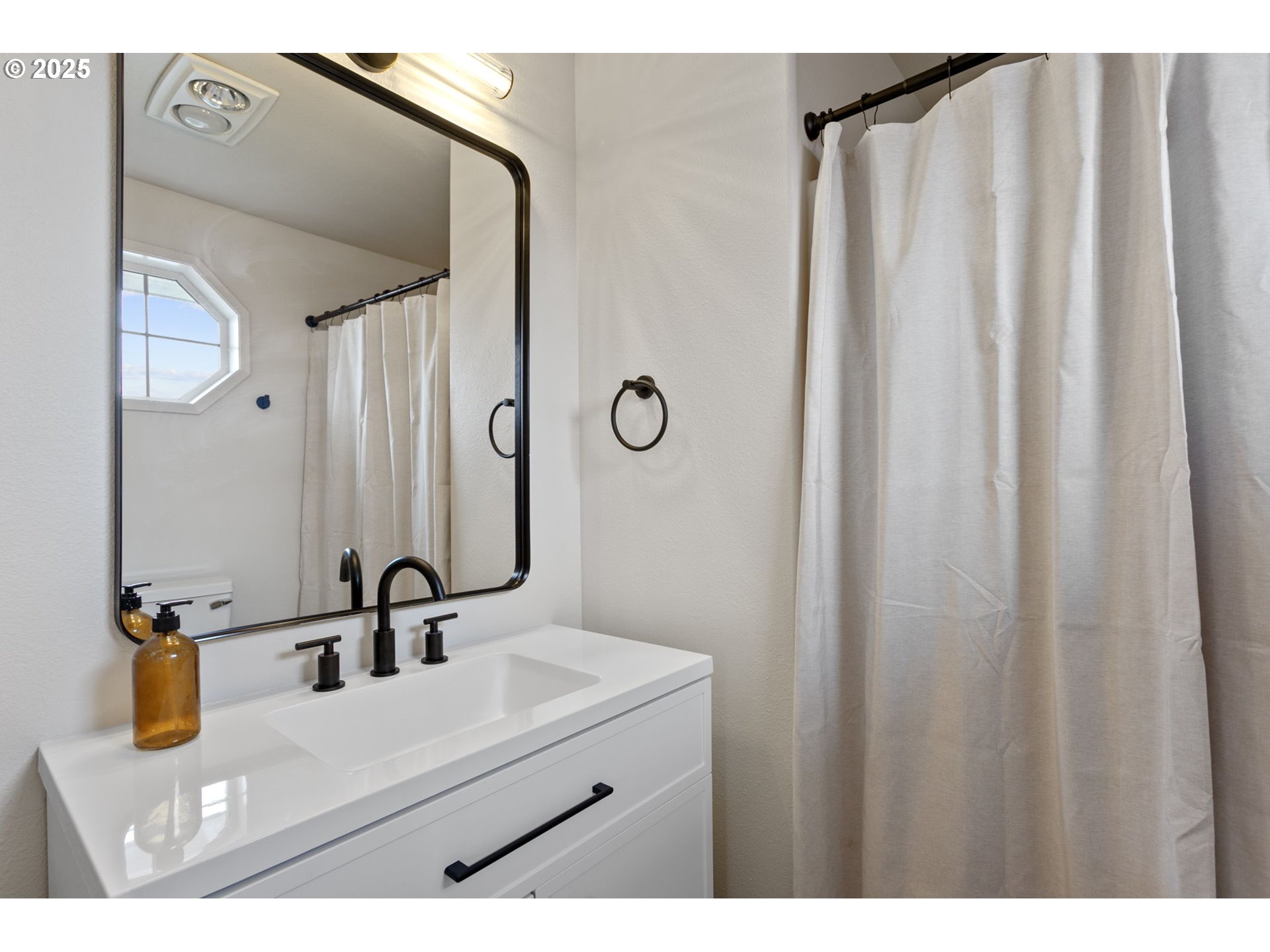 16301 Northeast 77th Circle Vancouver, WA 98682 - Photo 28 of 44 a bathroom with a sink and mirror