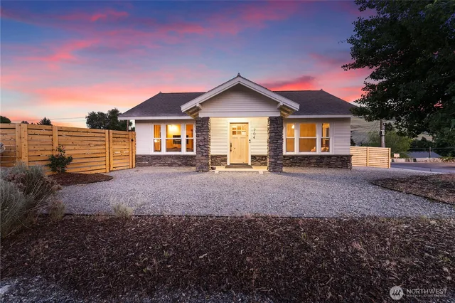 a view of house with yard and entertaining space