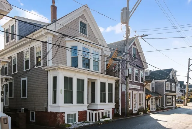 a view of gym equipment and sitting area