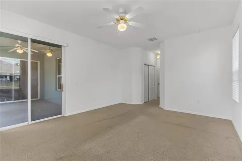 a bathroom with a sink toilet and a mirror