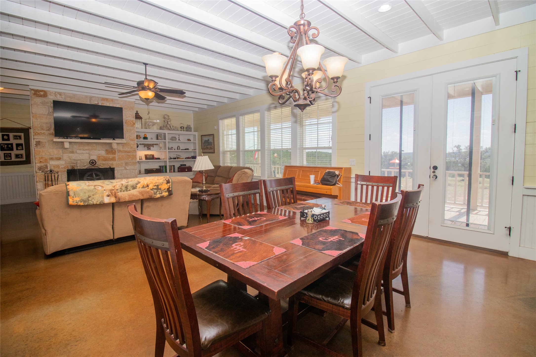 4237 County Road 330 Burnet, TX 78611 - Photo 12 of 40 a view of a dining room with furniture window and wooden floor