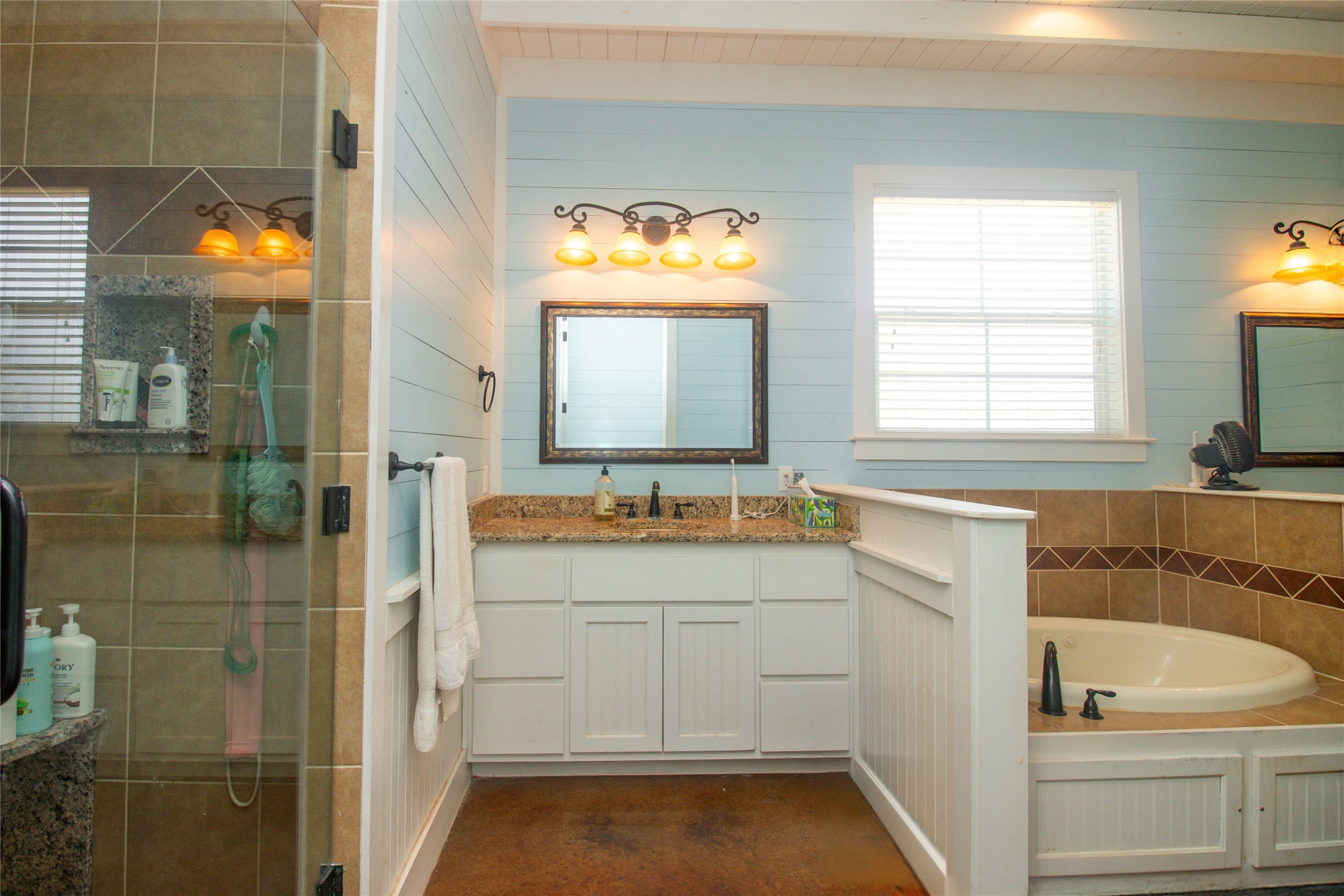 4237 County Road 330 Burnet, TX 78611 - Photo 20 of 40 a bathroom with a sink and a bathtub