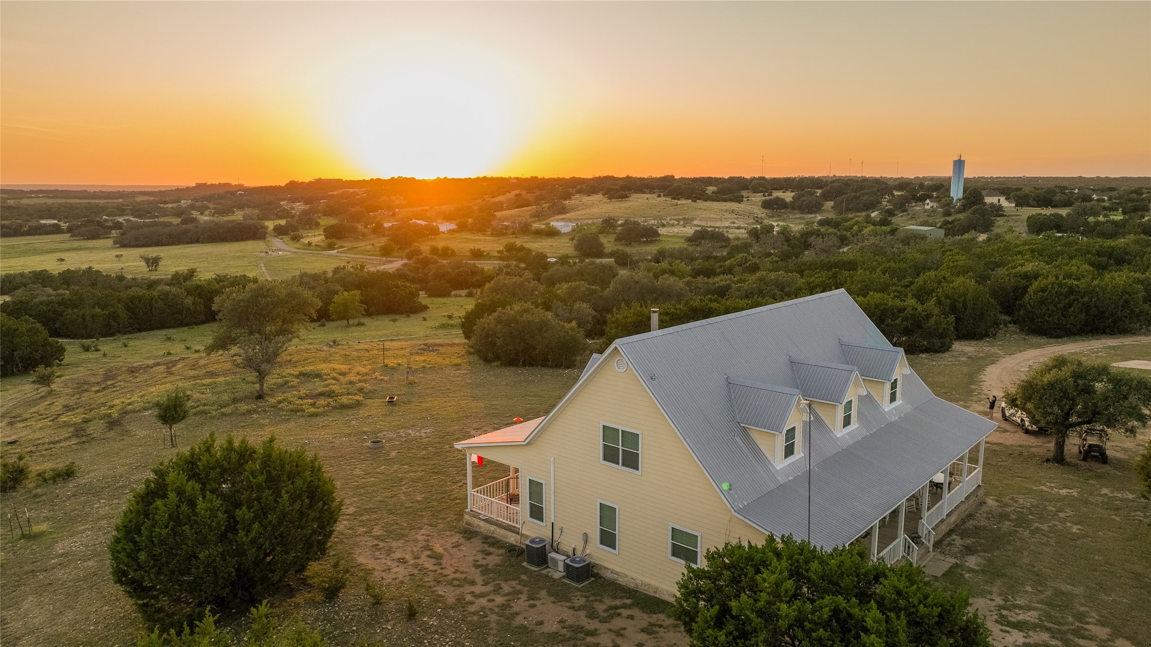 4237 County Road 330 Burnet, TX 78611 - Photo 2 of 40 a view of a house with a mountain in the background