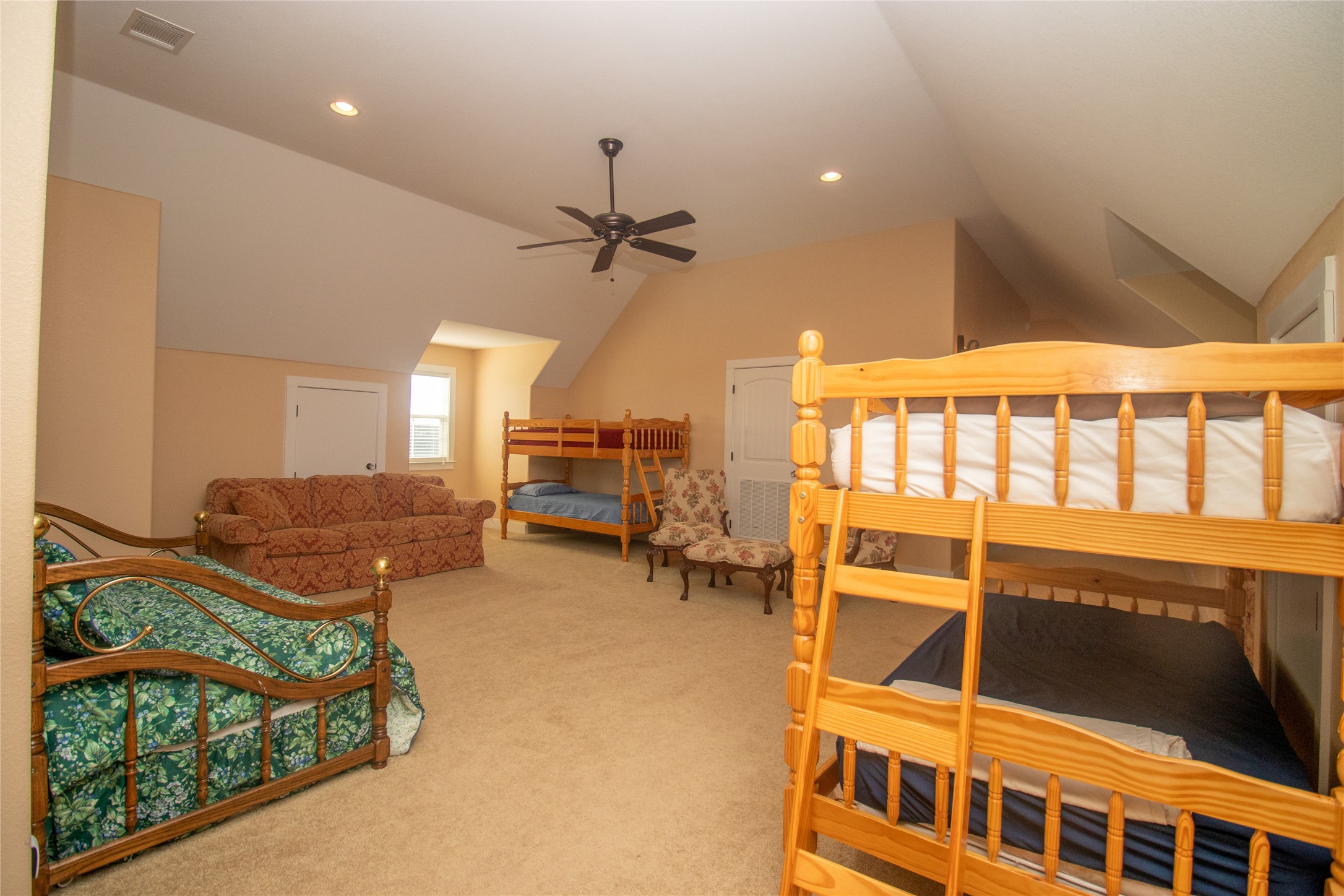 4237 County Road 330 Burnet, TX 78611 - Photo 26 of 40 a living room with a couch and a floor to ceiling window