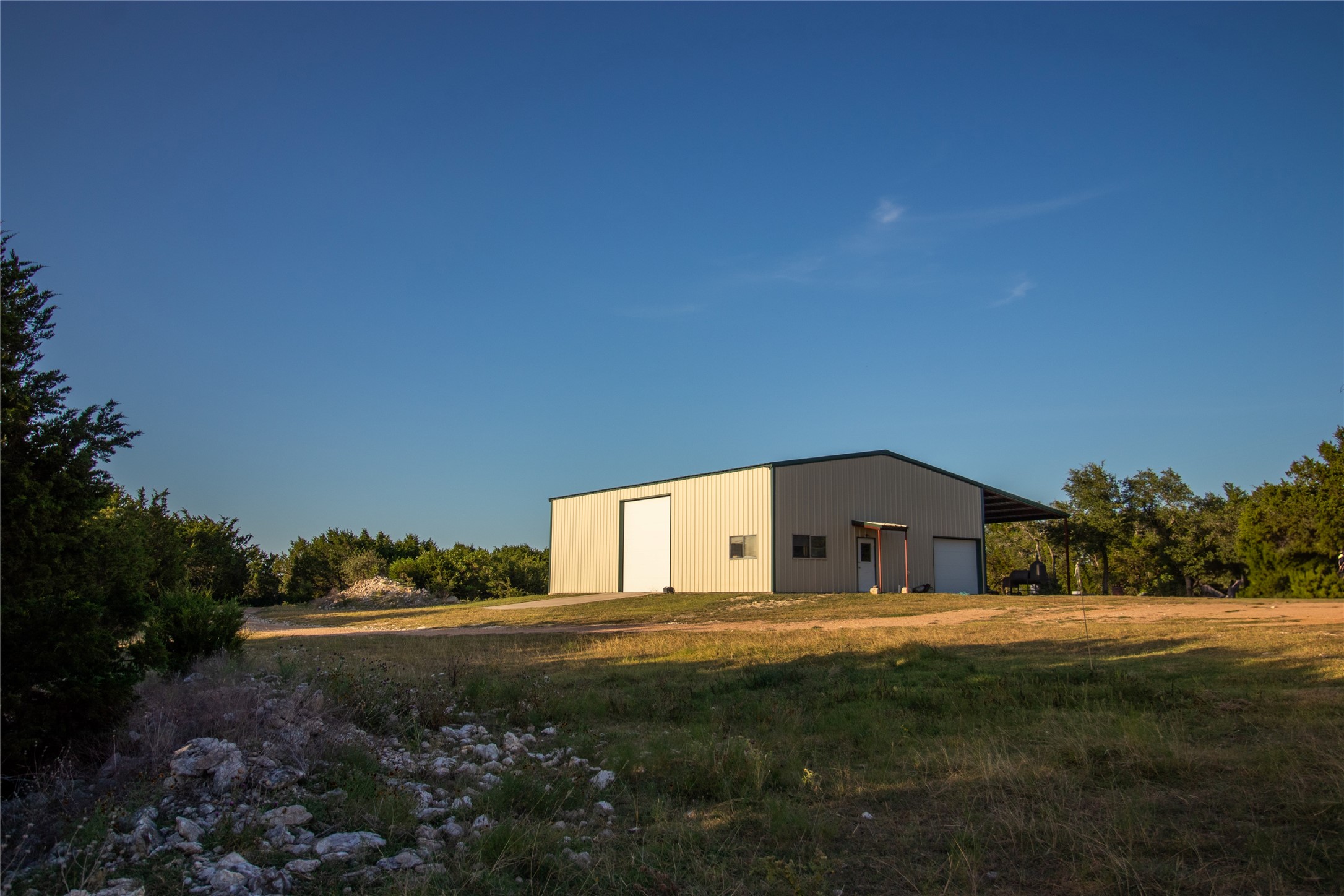 4237 County Road 330 Burnet, TX 78611 - Photo 34 of 40 a house view with a garden space