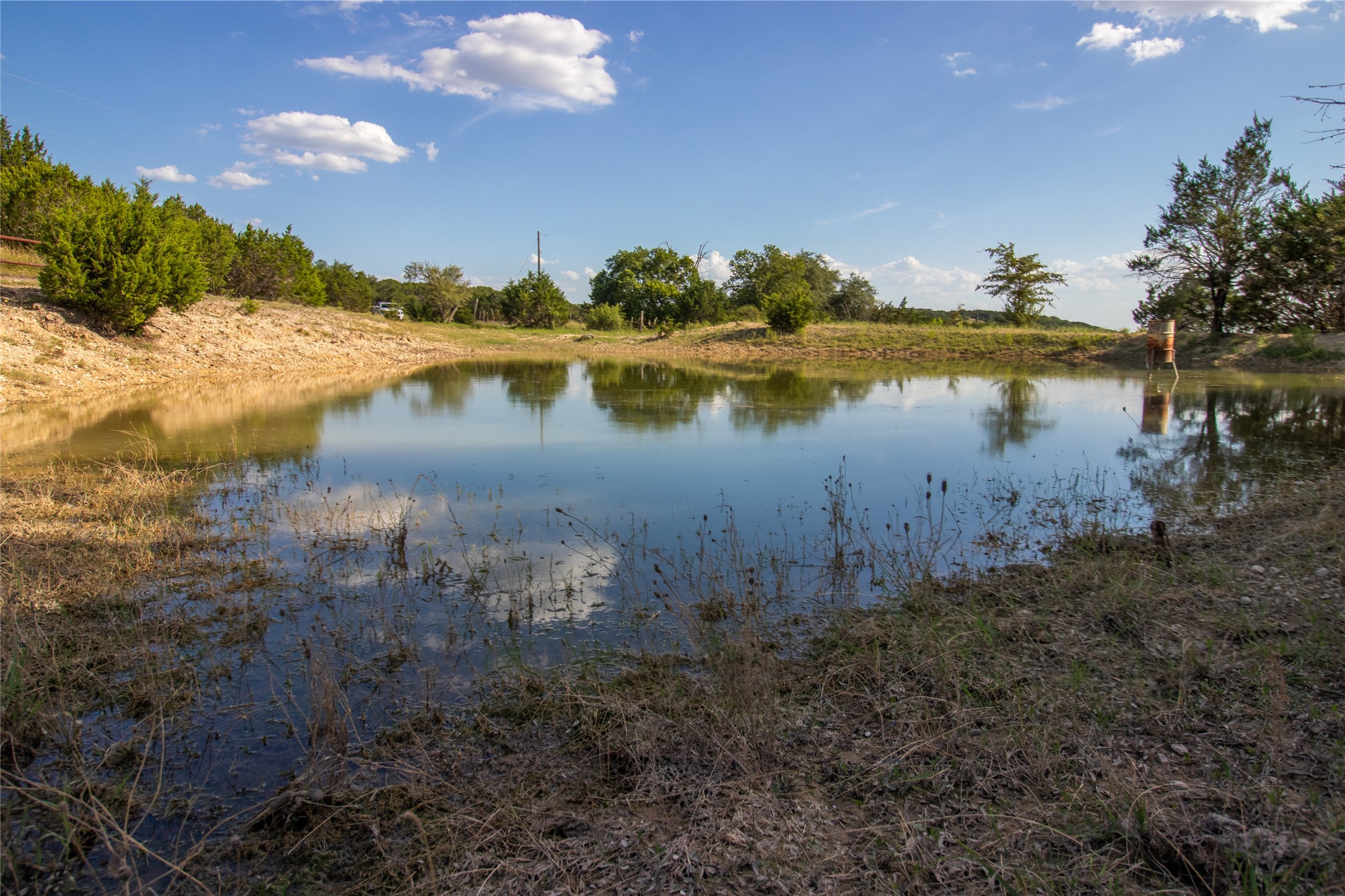 4237 County Road 330 Burnet, TX 78611 - Photo 9 of 40 a view of a lake with a yard