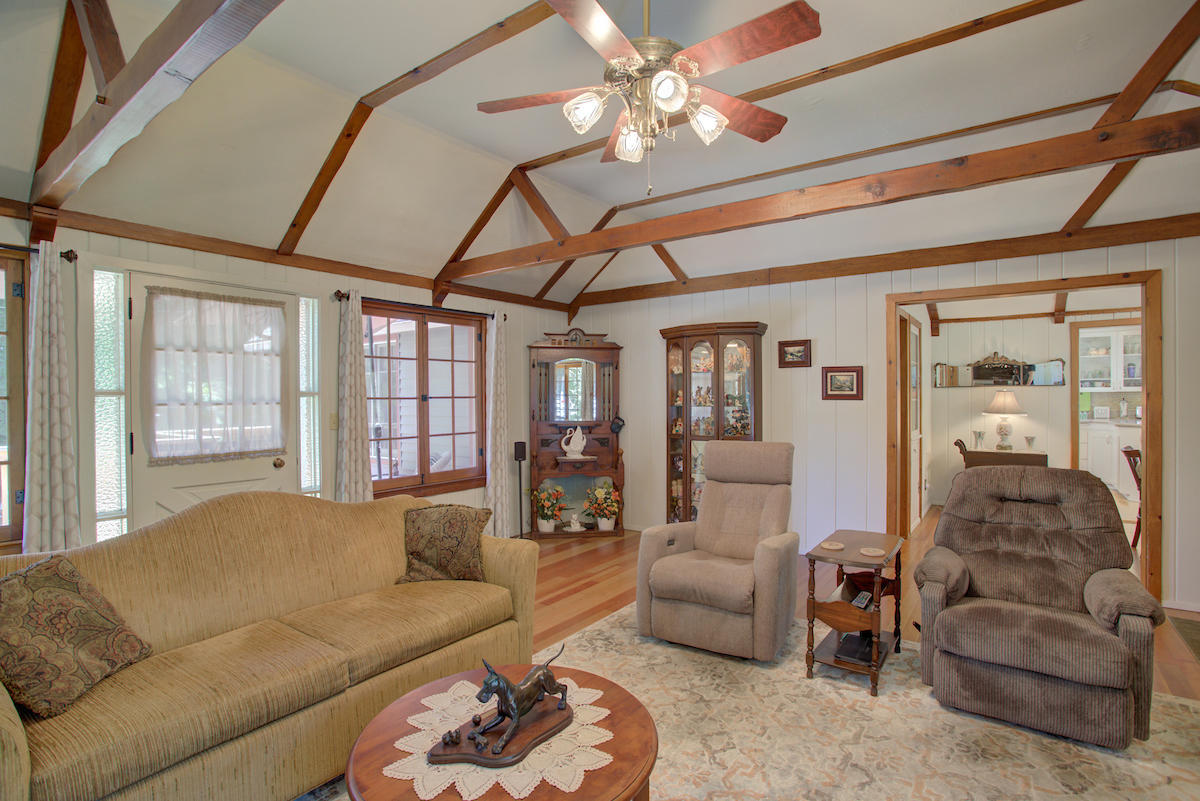 3184 Old Stage Road Central Point, OR 97502 - Photo 6 of 31 a living room with furniture and a large window