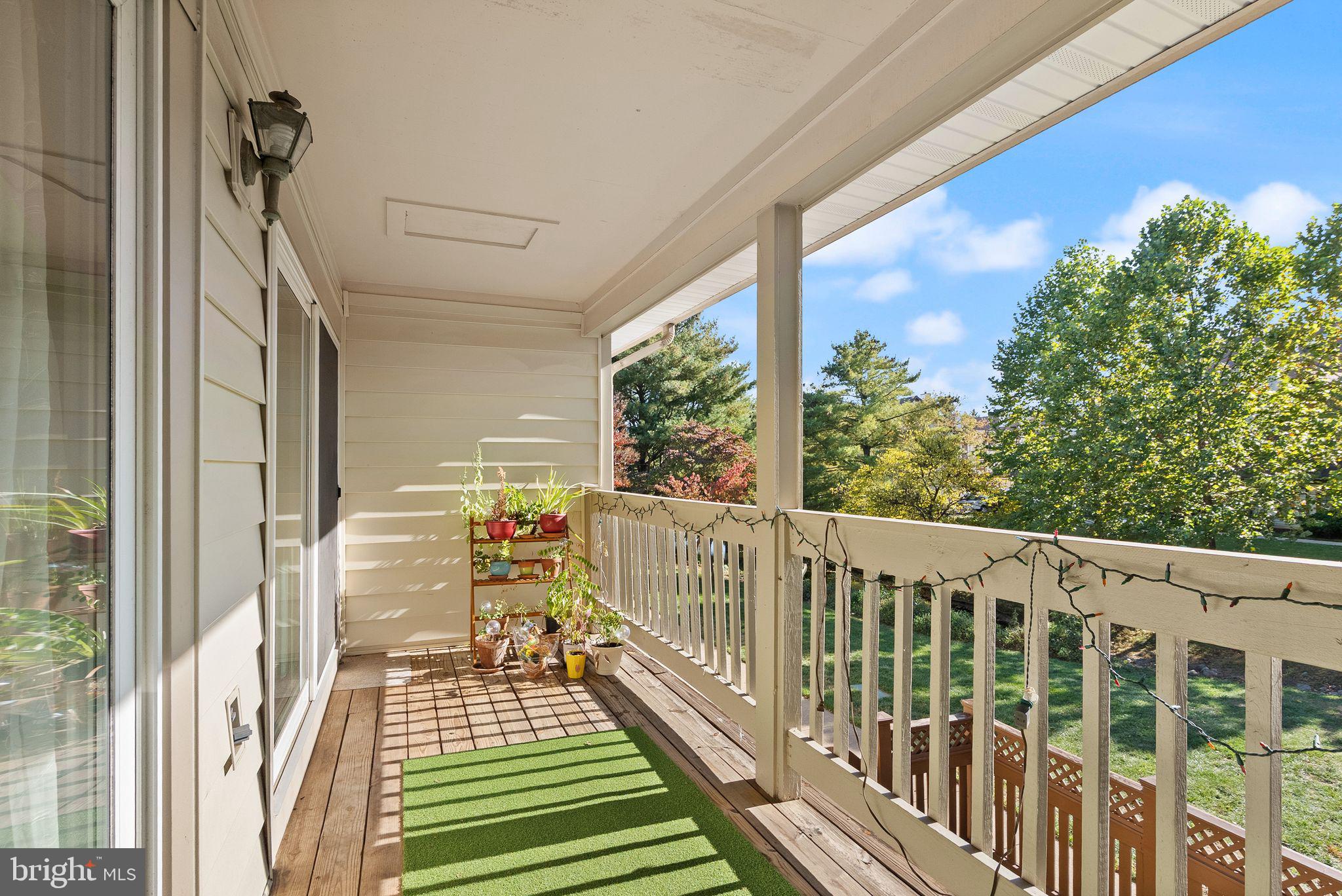 6905 Keyser Way Alexandria, VA 22310 - Photo 11 of 50 a view of a balcony with wooden floor