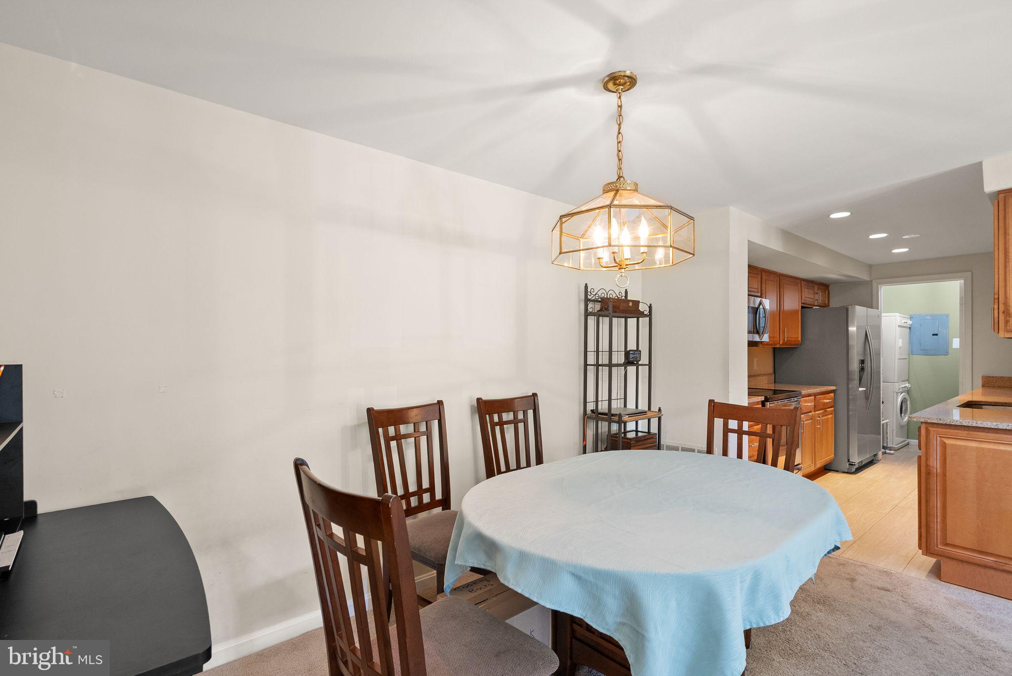 6905 Keyser Way Alexandria, VA 22310 - Photo 12 of 50 a view of a dining room with furniture