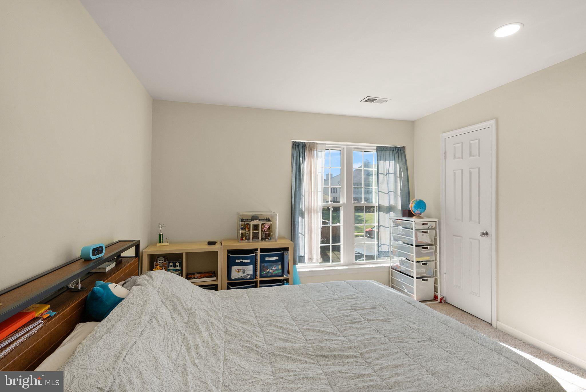 6905 Keyser Way Alexandria, VA 22310 - Photo 19 of 50 a bed room with a bed and a window