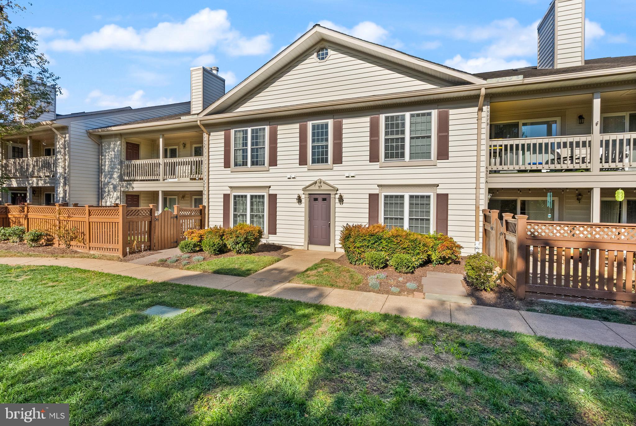 6905 Keyser Way Alexandria, VA 22310 - Photo 4 of 50 front view of a house with a yard