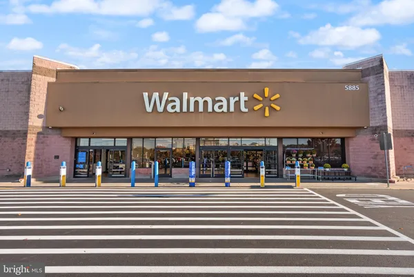 a view of a balcony with lake view and a wooden floor