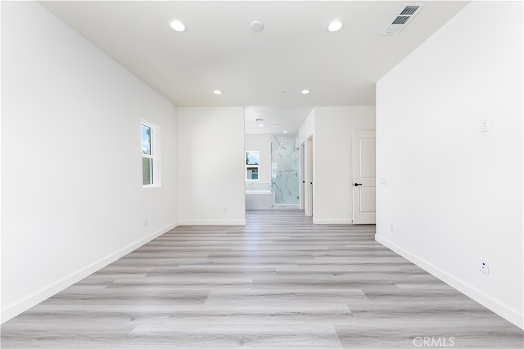 1371 Point Loma Place Walnut, CA 91789 - Photo 29 of 37 a view of an empty room with wooden floor