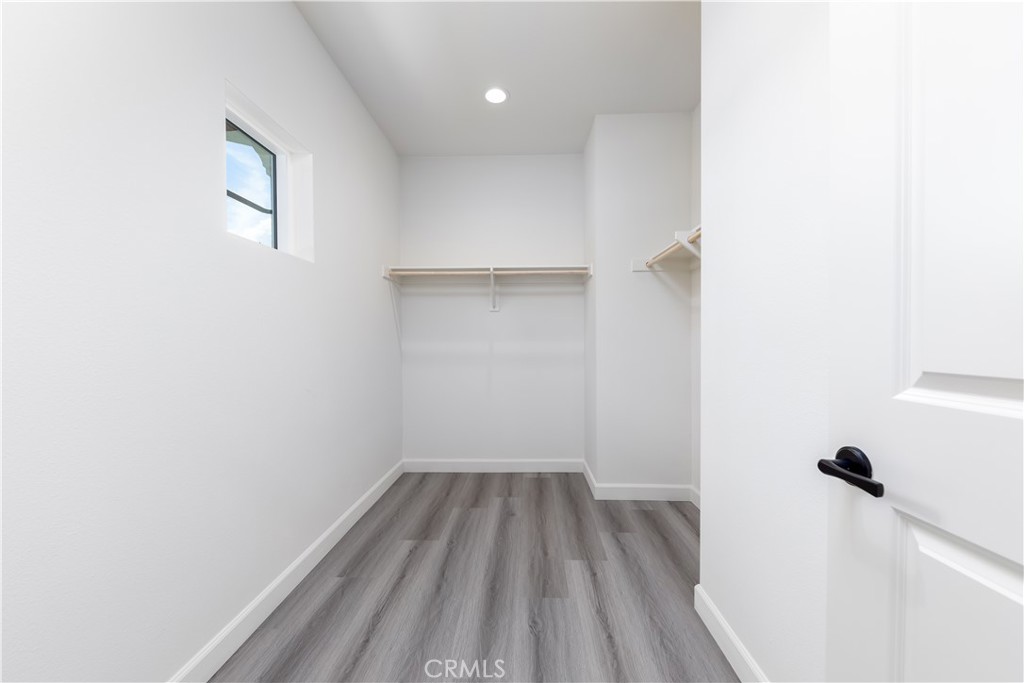 1371 Point Loma Place Walnut, CA 91789 - Photo 31 of 37 a view of a room with wooden floor and a window