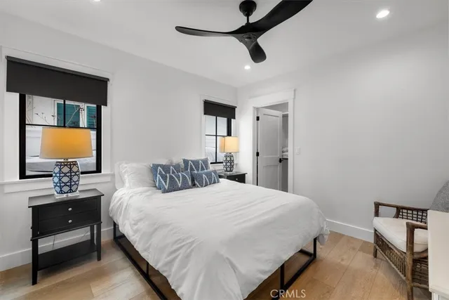 a bedroom with a bed and a walk in closet