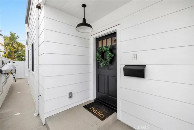 a view of an empty room and a window