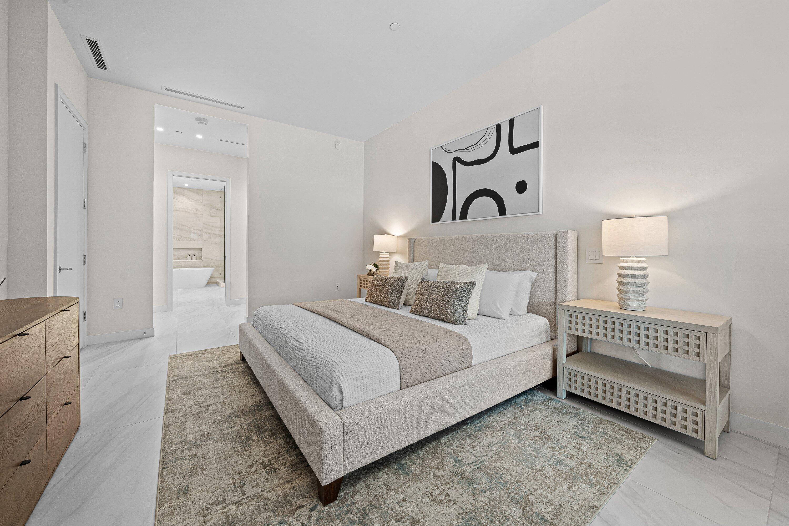 220 Southeast Mizner Boulevard, Unit 102 Boca Raton, FL 33432 - Photo 12 of 55 Primary Bedroom