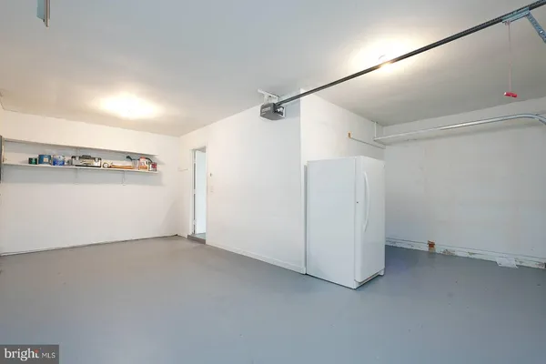 a bathroom with a toilet sink and a shower