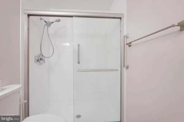 a view of room with hardwood floor