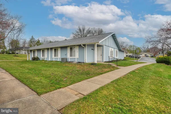 a front view of house with yard