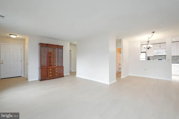 a view of a livingroom with wooden floor