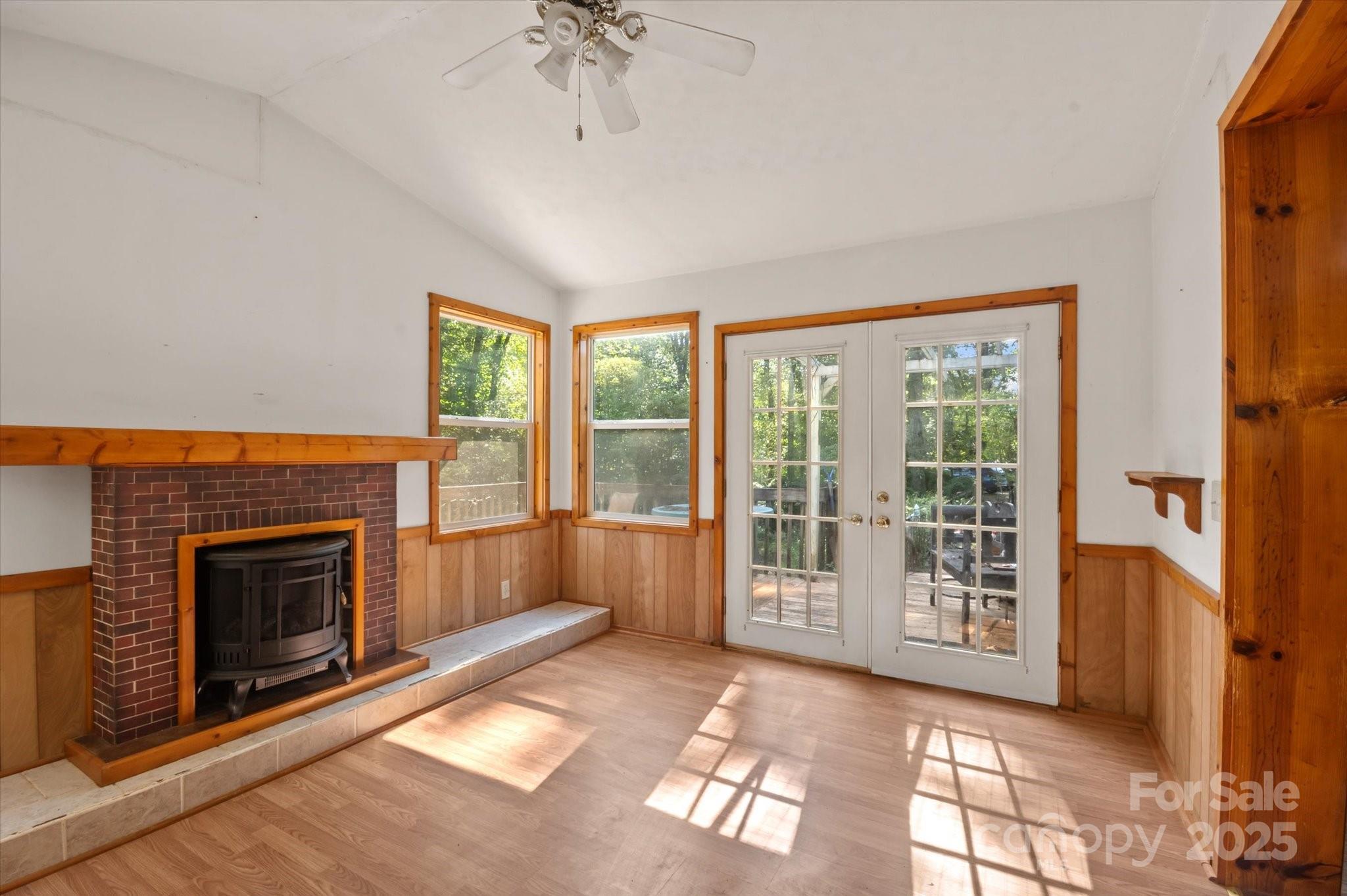7 Maple Drive Brevard, NC 28712 - Photo 12 of 31 a view of an empty room with a fireplace