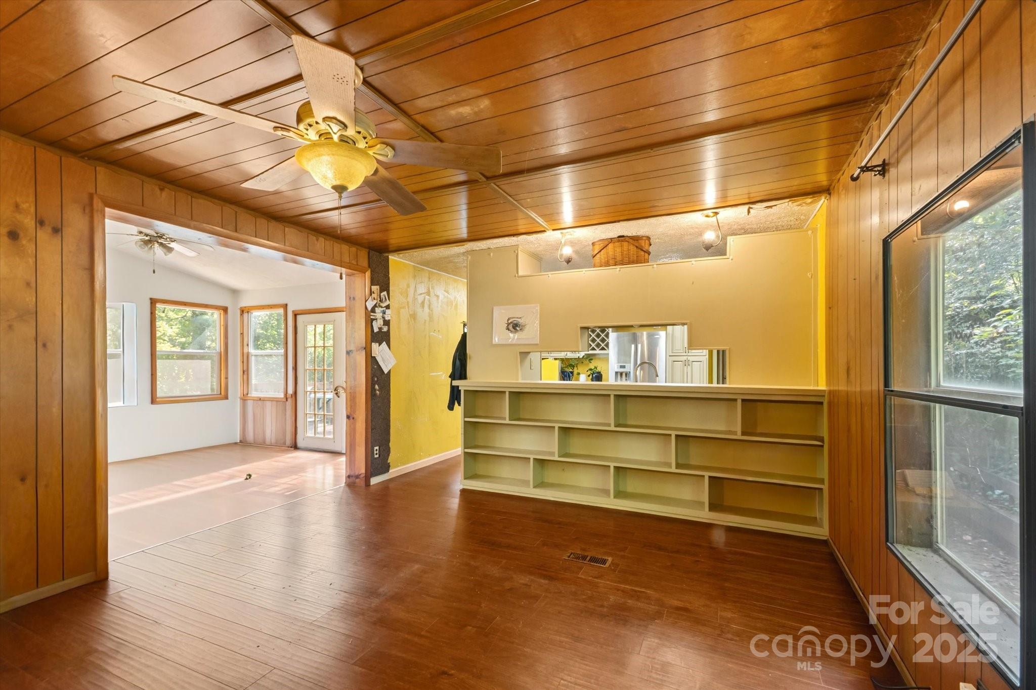 7 Maple Drive Brevard, NC 28712 - Photo 16 of 31 a room with wooden floor and windows