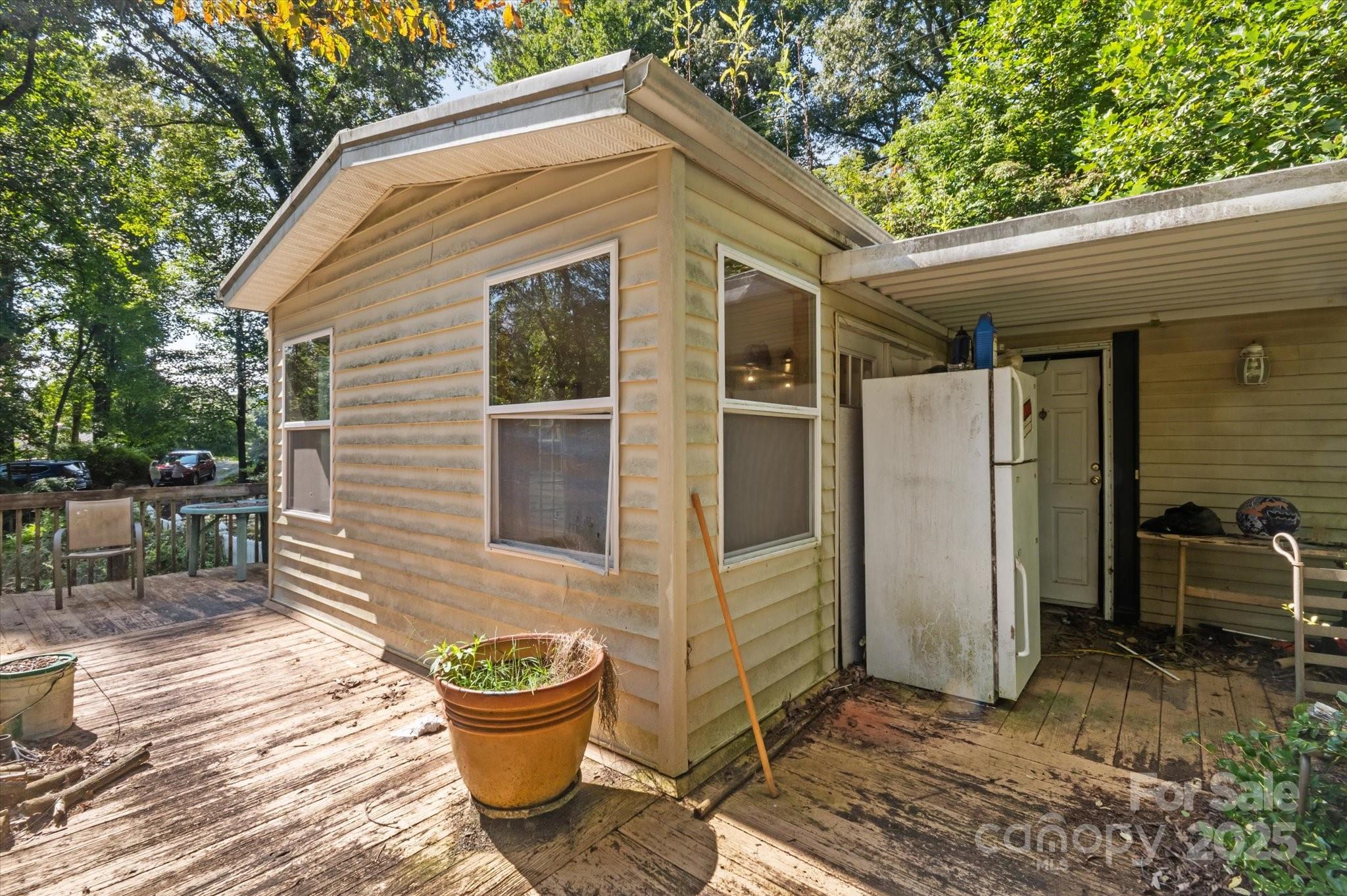 7 Maple Drive Brevard, NC 28712 - Photo 6 of 31 a front view of a house with patio