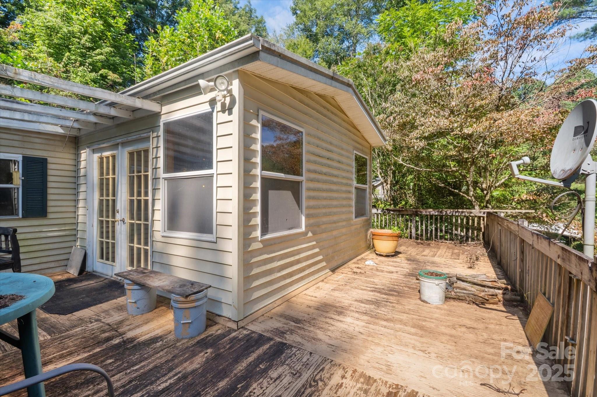 7 Maple Drive Brevard, NC 28712 - Photo 7 of 31 a backyard of a house with outdoor seating