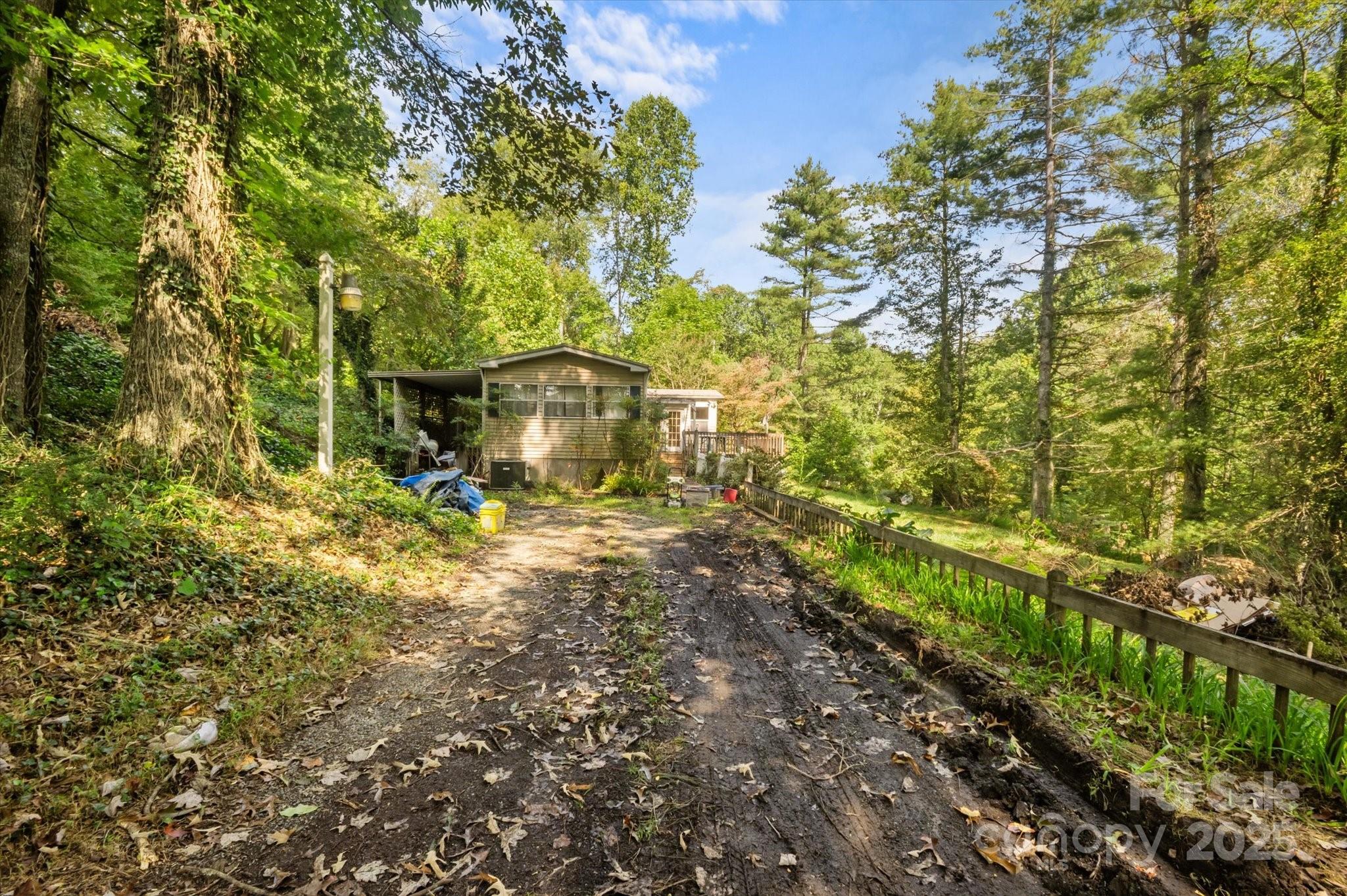7 Maple Drive Brevard, NC 28712 - Photo 8 of 31 a view of a house with a yard