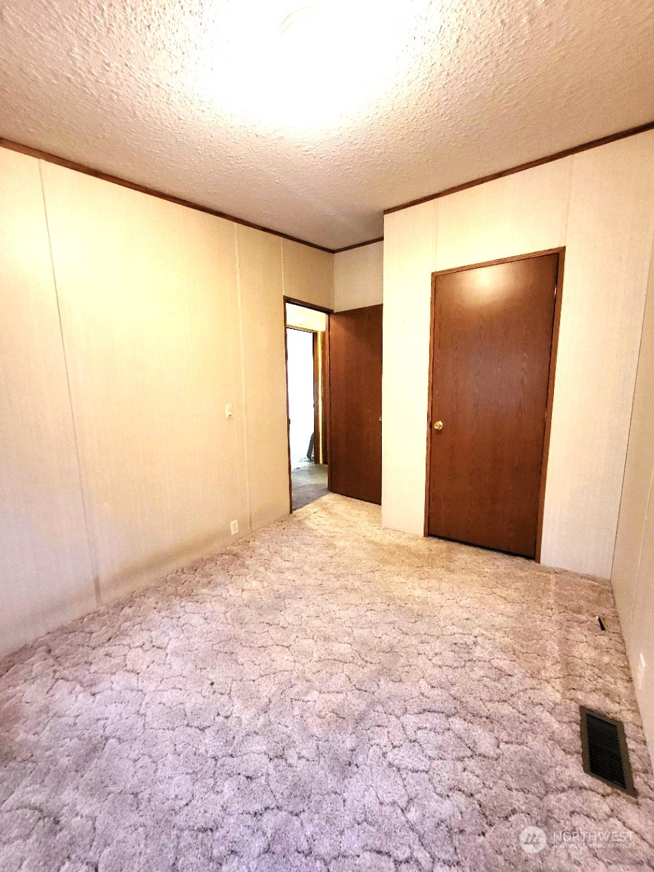 2285 Basin Street Southwest, Unit 11 Ephrata, WA 98823 - Photo 13 of 27 a view of an empty room with a window