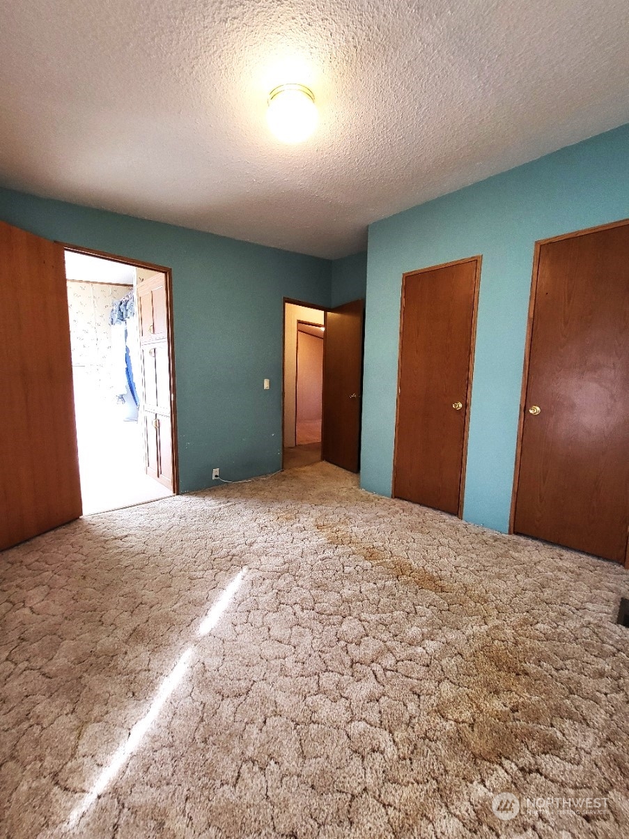 2285 Basin Street Southwest, Unit 11 Ephrata, WA 98823 - Photo 17 of 27 a view of a livingroom with a staircase