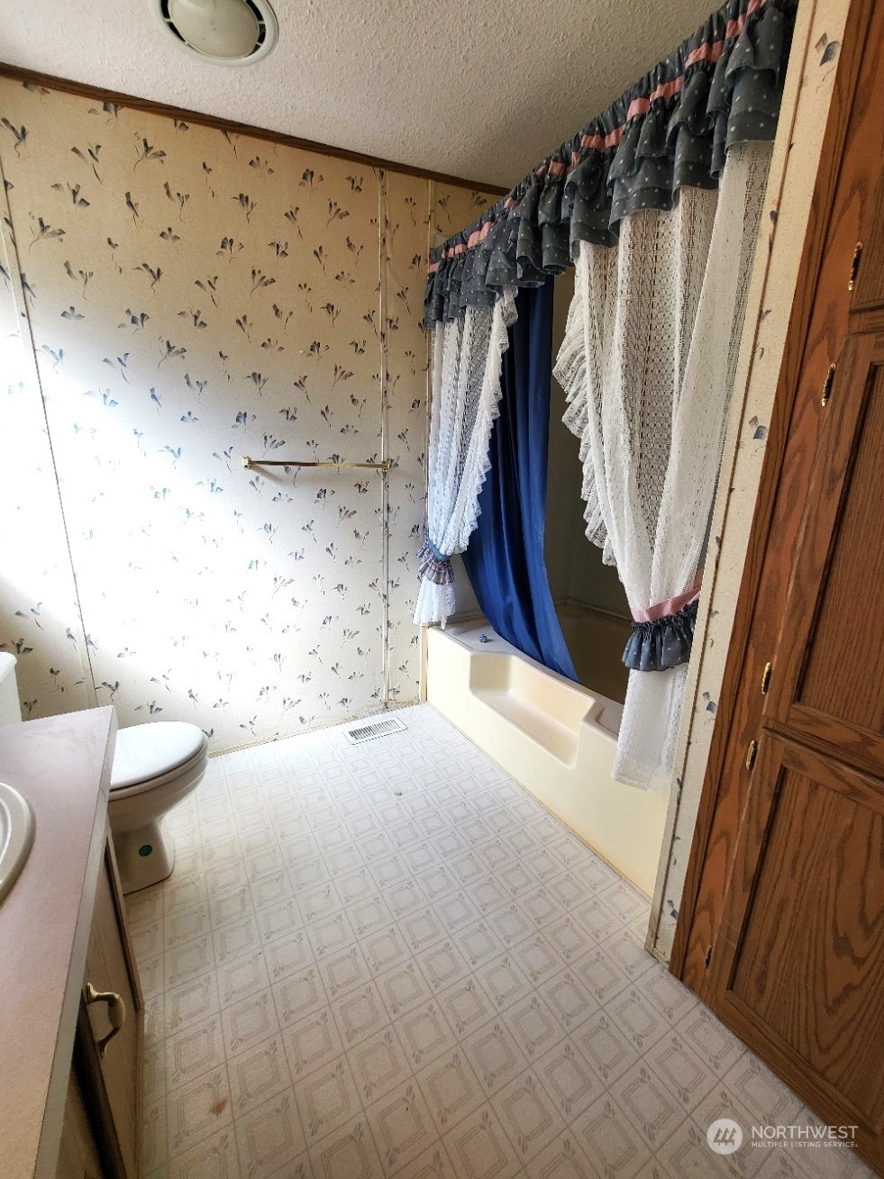 2285 Basin Street Southwest, Unit 11 Ephrata, WA 98823 - Photo 19 of 27 a view of walk in closet with clothes and shoes