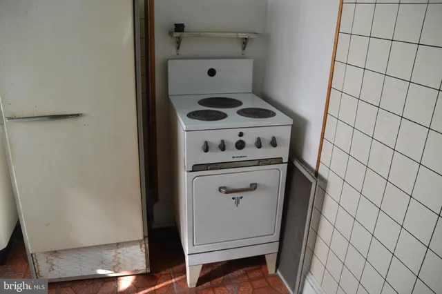 a bathroom with a sink and a window