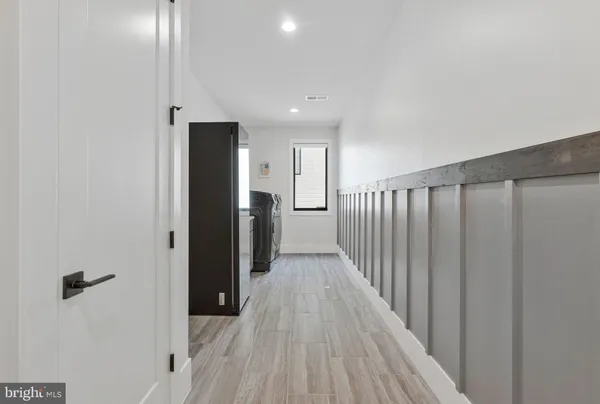 a view of an empty room with a sliding door