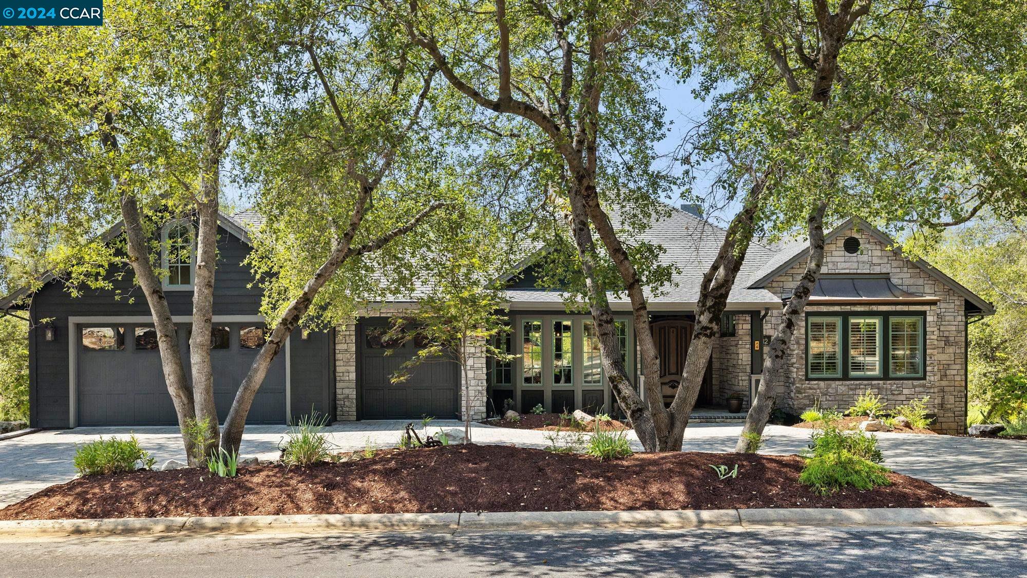 312 Catalpa Lane Angels Camp, CA 95222 - Photo 1 of 1 a front view of a house with a yard