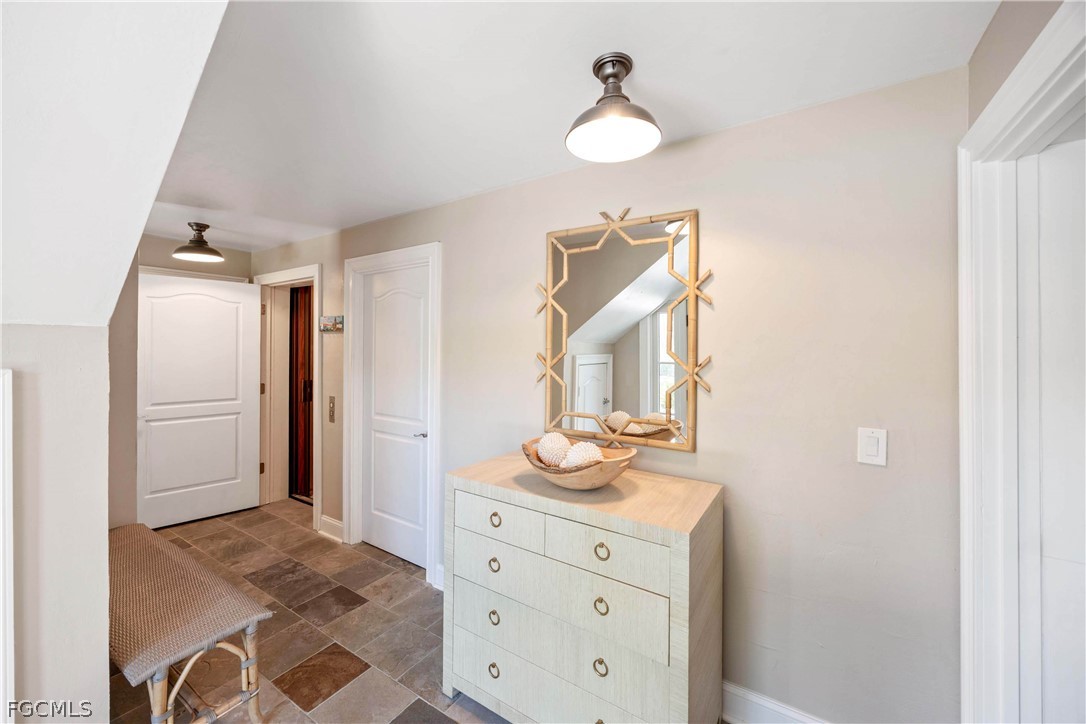 528 Lighthouse Way Sanibel, FL 33957 - Photo 13 of 49 a bedroom with a bed and a dresser