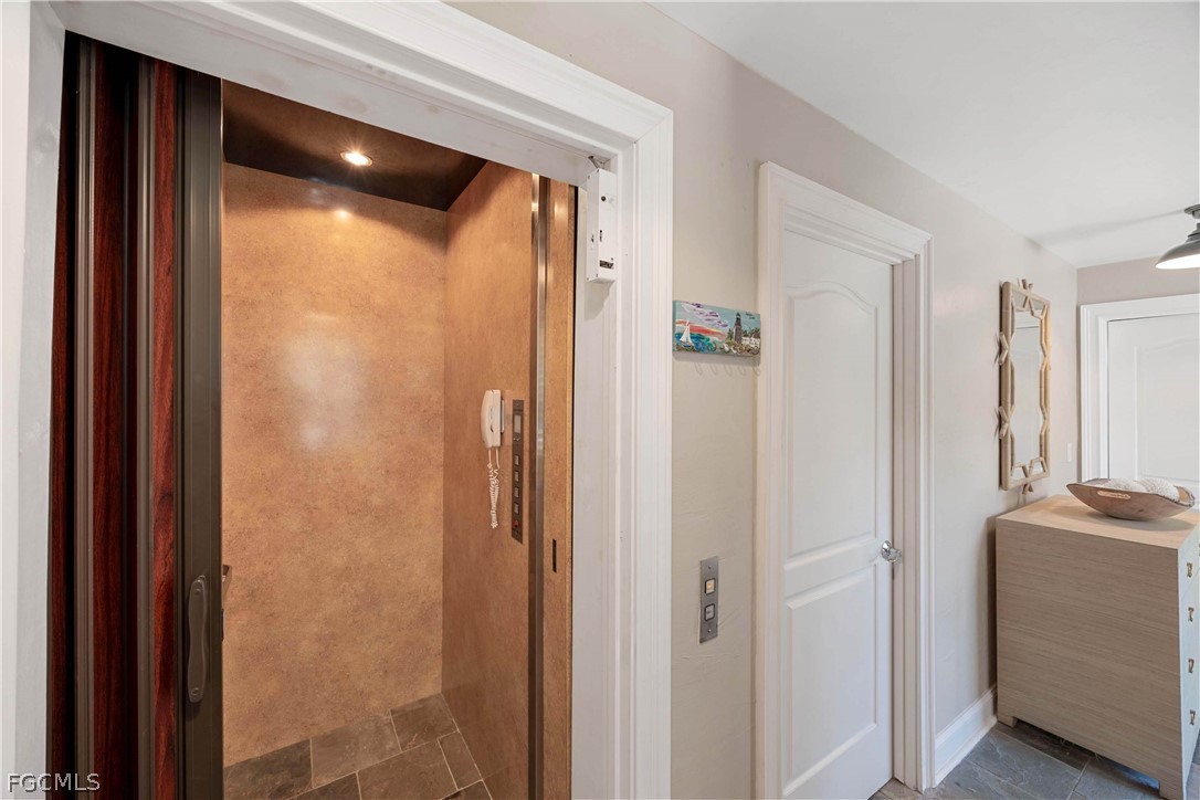 528 Lighthouse Way Sanibel, FL 33957 - Photo 14 of 49 a view of a bathroom from a hallway