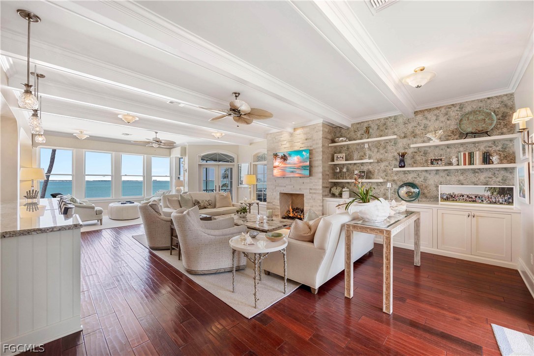528 Lighthouse Way Sanibel, FL 33957 - Photo 15 of 49 a view of a dining room with furniture window and wooden floor