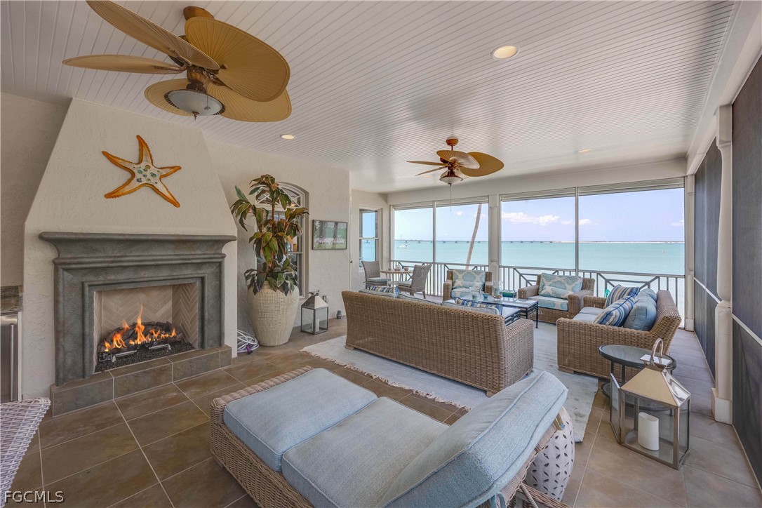 528 Lighthouse Way Sanibel, FL 33957 - Photo 37 of 49 a living room with furniture and a fireplace
