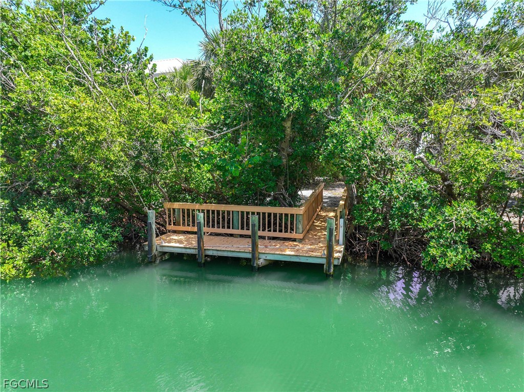528 Lighthouse Way Sanibel, FL 33957 - Photo 46 of 49 a view of a chair with a deck