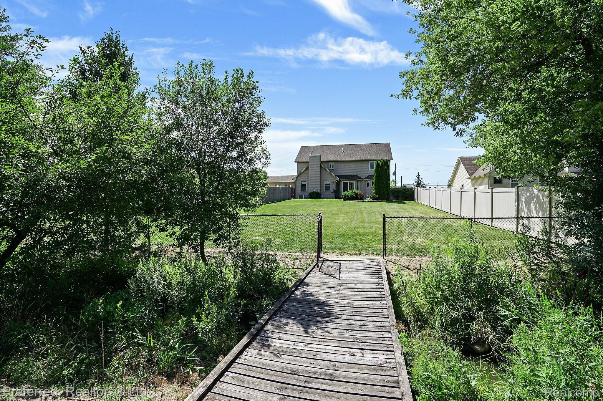 24545 Merriman Road New Boston, MI 48164 - Photo 18 of 45 Bridge over Creek.jpg