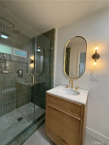 a bedroom with bed and window