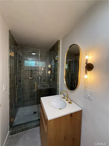 a bedroom with bed and window