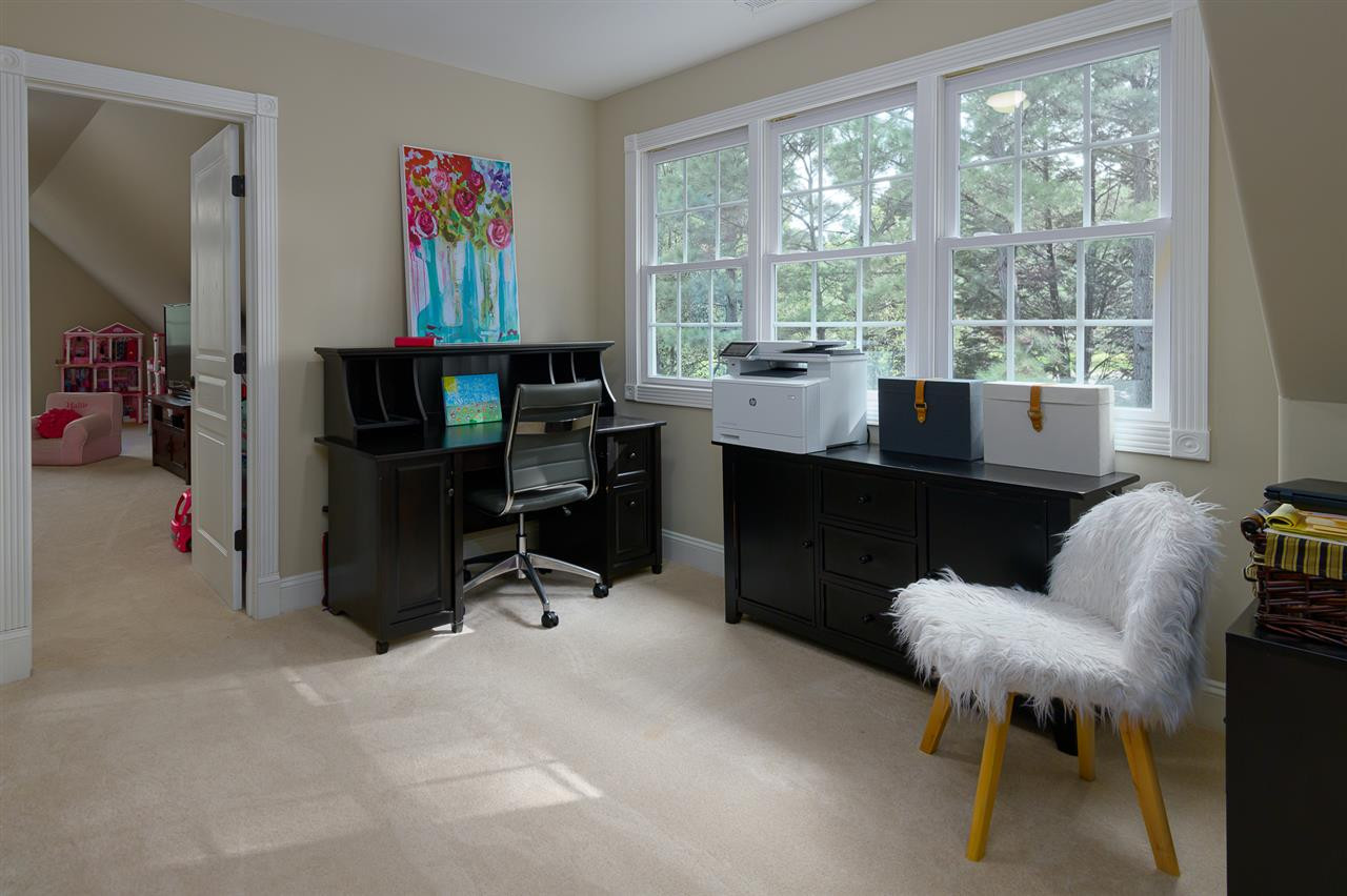 1000 Streeter Lane Raleigh, NC 27614 - Photo 18 of 30 a view of a workspace with furniture and a window